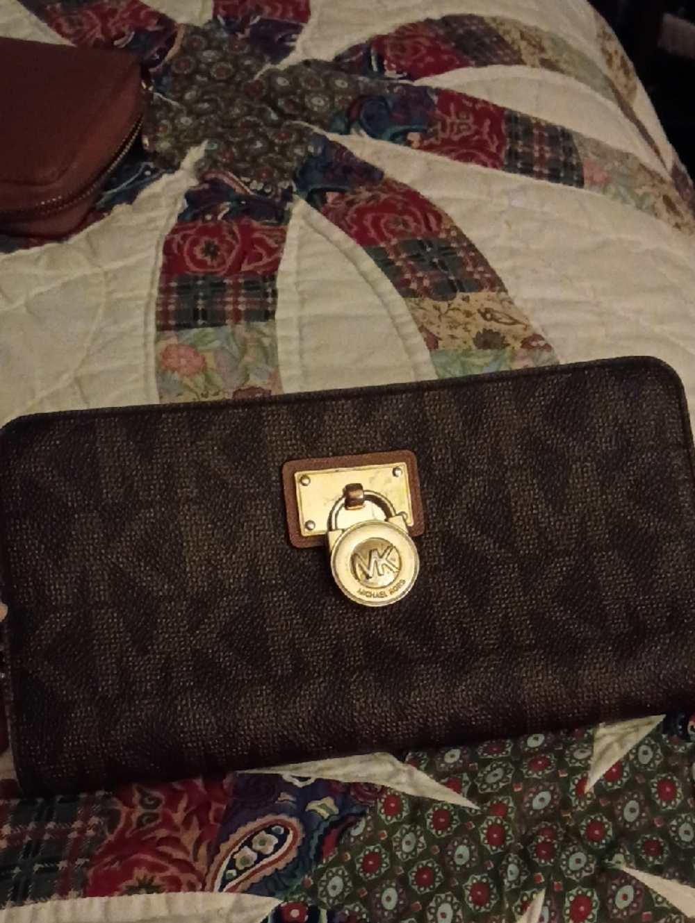 Michael Kors Dark Brown Monogram Zip-Around Wallet with Gold Logo Charm